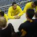 Michigan junior Jordan Morgan chats with fans as he signs autographs with his teammates during an open house at Crisler Arena on Friday evening. Melanie Maxwell I AnnArbor.com
